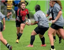  ??  ?? Manukura’s Kalyn Cook looks for space during her side’s loss to St Mary’s College in the Hurricanes girls final on Saturday.