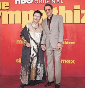  ?? ?? Actress Kieu Chinh and Oscar winner Robert Downey Jr., star and co-executive producer of the HBO miniseries “The Sympathize­r,” at the Los Angeles premiere on April 9. The seven-episode series, the second of which airs Sunday night, also is streaming on Max.