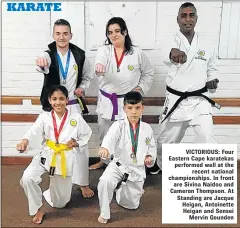  ??  ?? VICTORIOUS: Four Eastern Cape karatekas performed well at the recent national championsh­ips. In front are Sivina Naidoo and Cameron Thompson. At Standing are Jacque Heigan, Antoinette Heigan and Sensei Mervin Gounden