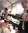  ?? COURTESY NANTUCKET WINE AND FOOD
FESTIVAL ?? POUR IT ON: The Nantucket Wine and Food Festival offers a chance to sip, mingle and enjoy the island’s beauty.