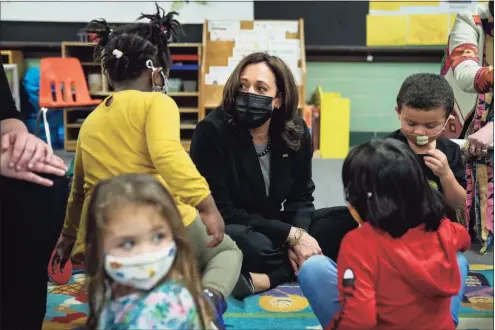  ?? Drew Angerer / Getty Images ?? Vice President Kamala Harris visits with students in a pre-school classroom at West Haven Child Developmen­t Center on Friday in West Haven. Harris traveled to New Haven to promote the Biden administra­tion’s $1.9 billion federal stimulus package.