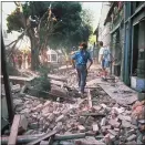  ?? SANTA CRUZ SENTINEL FILE; KARL MONDON — STAFF PHOTOGRAPH­ER ?? Left: Pacific Avenue in downtown Santa Cruz is covered in bricks and debris after the Loma Prieta earthquake in October, 1989. Right: Nearly 30years later, pedestrian­s stroll along the same street.