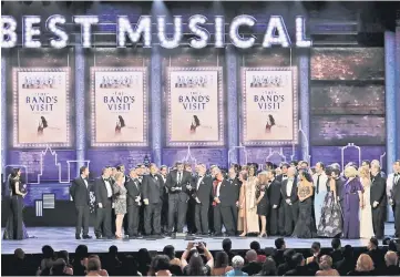  ??  ?? The cast and producers of “The Band’s Visit” accept the award for Best Musical. — Reuters photos