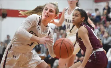  ?? PETE BANNAN - MEDIANEWS GROUP ?? Cardinal O’Hara’s Greta Miller, left, moves the ball in the third quarter against Conestoga in the first round of PIAA Class 6A state playoffs Friday evening.