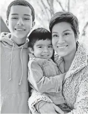  ??  ?? Lisette LeJeune and her two sons, Adonnis, 14, and Matteo, 3. LISETTE LEJEUNE