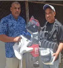  ?? Photo: Waisea Nasokia ?? South Pacific Boxing Promotions promoter Freddy Chand receives boxing equipment from USA based -Mohammed Saddiq in Nadi on October 24, 2019.