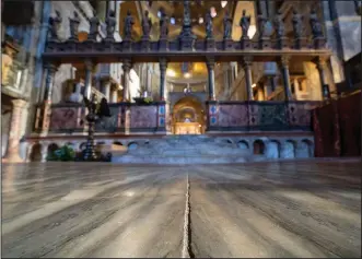  ?? ?? Signs of erosion are visible Dec. 7 inside St. Mark’s Basilica in Venice.