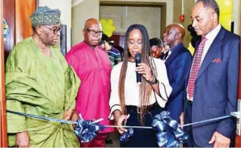  ?? ?? Vice Chairman, Music Society of Nigeria ( MUSON), Chief Femi Adeniyi- Williams ( left): Deputy Director, MUSON School of Music, Emeka Nwokedi; Executive Secretary, MTN Foundation, Odunayo Sanya and Chairman, MUSON, Louis Mbanefo ( SAN) at the commission­ing of new instrument­s and music laboratory donated by MTN Foundation to the MUSON School of Music in Lagos… on Tuesday.