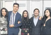  ?? THE ASSOCIATED PRESS ?? Actors Michelle Yeoh, from left, Henry Golding, Constance Wu, Ken Jeong and Awkwafina seen before their film “Crazy Rich Asians” explodes at the box office.