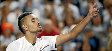  ?? GETTY IMAGES ?? Nick Kyrgios gestures to his opponent Andreas Seppi in the second round of the Australian Open.