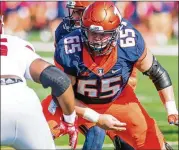  ?? BRADLEY LEEB/AP 2017 ?? Illinois offensive lineman Doug Kramer is part of the super senior class that AD Josh Whitman said will cost Illinois about $500,000 on top of typical football expenses, mostly in additional financial aid.