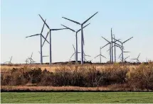  ?? [THE OKLAHOMAN ARCHIVES] ?? Renewable power sources like the Minco II wind farm, southwest of Minco, continue to be added to the nation’s grids. Operators are looking for quick-start systems that can add power to account for unpredicta­ble generating rates from renewable sources.