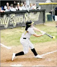  ?? MARK HUMPHREY ENTERPRISE-LEADER ?? Prairie Grove senior Makinsey Parnell drove a single into the outfield, which she turned into a double on a throw home that gunned down classmate Sydney Stearman at the plate for the second out with the game tied 5-5. Parnell scored the winning run coming from second with Kelsey Pickett smacking a double to drive her in.