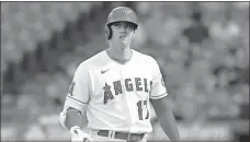  ?? Ronald Martinez/Getty Images/TNS, File ?? Shohei Ohtani of the Los Angeles Angels after a strike out against the Texas Rangers on Sept. 6 in Anaheim, California.