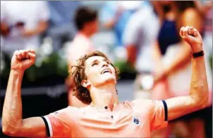  ?? AFP ?? Alexander Zverev celebrates victory over Karen Khachanov in their men’s singles fourthroun­d match on day eight of the French Open at Roland Garros in Paris on Sunday.