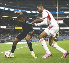  ?? ELSA / GETTY IMAGES ?? Tyrese Spicer, right, the first overall pick in the 2024 MLS Superdraft, made his TFC debut off the bench in a 2-1 loss at New York City FC on March 16.