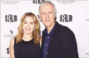  ?? C FLANIGAN/GETTY IMAGES NORTH AMERICA/AFP ?? Kate Winslet and Director James Cameron attend SFFILM’s 60th Anniversar­y Awards Night at Palace of Fine Arts Theatre on December 5, in San Francisco, California.