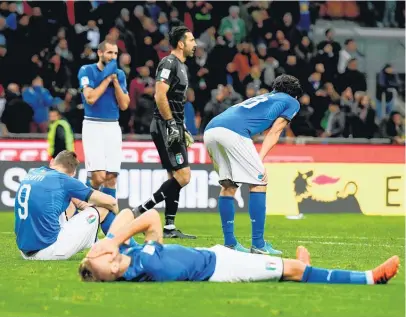  ?? Picture / AP ?? Shocked Italian players were in tears after a 0-0 draw with Sweden ended their Fifa World Cup hopes.