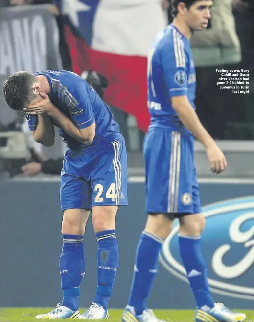  ??  ?? Feeling down: Gary
Cahill and Oscar after Chelsea had gone 2-0 behind to Juventus in Turin
last night