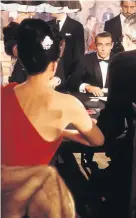  ?? MGM STUDIOS ?? Eunice Gayson sits with her back to the camera opposite Sean Connery as James