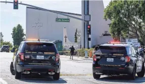  ?? RINGO CHIU/AFP VIA GETTY IMAGES ?? Police respond to a shooting inside Geneva Presbyteri­an Church in Laguna Woods, Calif., on Sunday.