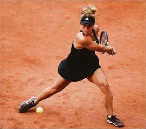  ?? Thibault Camus / Associated Press ?? Leolia Jeanjean plays a shot against Karolina Pliskova during their second-round match at the French Open on Thursday.