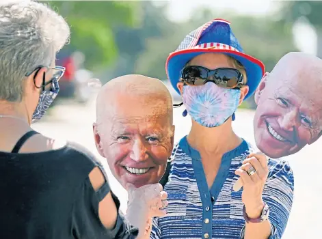  ??  ?? CAMPAIGN TRAIL: Sabina Geiser and Phyllis Smith preparing for a Ridin’ With Biden event in Plano, Texas.