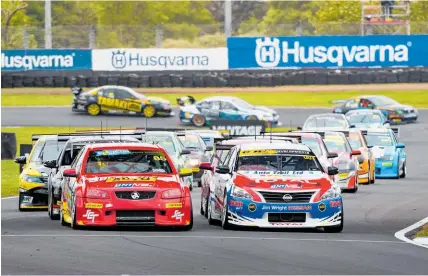  ?? Photo / Matthew Hansen ?? Jack Smith and Nick Ross lead the BNT V8s pack at round one of the series. Round two kicks off this weekend at Pukekohe Raceway.