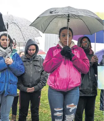  ?? AP ?? ‘TOUGH CITY’: Attendees stand during a moment of silence yesterday during the Rally for Peace and Tree of Life Victims, which remembered the 11 people shot to death two weeks ago in a Pittsburgh synagogue.