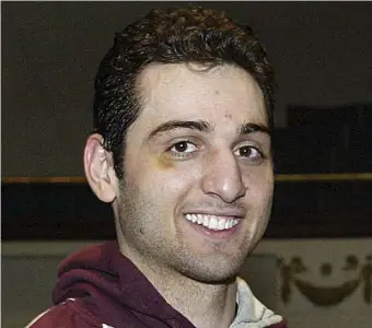  ?? JULIA MALAKIE / THE SUN OF LOWELL FILE ?? RUTHLESS: Tamerlan Tsarnaev was said to be responsibl­e for the murders of three men in Waltham in 2011 because he suspected that they sold marijuana. An
FBI agent said in a newly unsealed affidavit that Tsarnaev’s friend, Ibragim Todashev, left, confessed to participat­ing in the killings.