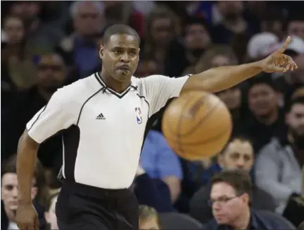  ?? CARLOS OSORIO - THE ASSOCIATED PRESS ?? FILE - In this March 26, 2016, file photo, referee Leroy Richardson signals during the first half of an NBA basketball game between the Detroit Pistons and the Atlanta Hawks in Auburn Hills, Mich.