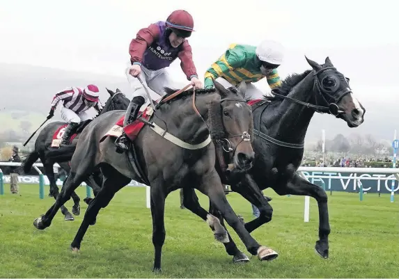  ?? Alan Crowhurst/Getty Images ?? SATURDAY, NOVEMBER 17, 2018Josies Orders and jockey Mark Walsh, right, get up to win the Cross Country Chase at Cheltenham yesterday – Horse Racing Pages 58-67