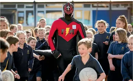  ?? PHOTO: JOSEPH JOHNSON/STUFF ?? Christchur­ch’s every-day super hero Flatman has returned from retirement after two years to spread some good in the city.