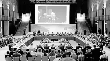  ??  ?? Kickl is seen on a giant screen while speaking during a round of discussion­s as part of an informal meeting that focuses in particular on a common migration plan in Innsbruck, Austria. — AFP photo