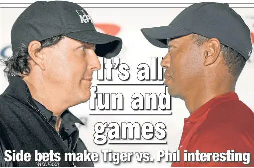  ?? Getty Images ?? Phil Mickelson and Tiger Woods face off during a press conference Tuesday for their head-to-head pay-per-view match on Friday at the Shadow Creek Golf Course in Las Vegas. BIG SHOWDOWN: