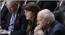  ?? THE ASSOCIATED PRESS ?? Sen. Dianne Feinstein, D-Calif., the ranking member of the Senate Judiciary Committee, flanked by the Committee’s Chairman Sen. Charles Grassley, R-Iowa, left, and Sen. Patrick Leahy, D-Vt., speaks in opposition of the nomination of President Donald Trump’s Supreme Court nominee Neil Gorsuch, Monday, April 3, 2017, on Capitol Hill in Washington.