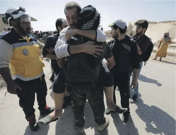  ?? Reuters ?? Rebel fighters released from government prisons celebrate their arrival in the El Eis area of southern Aleppo province