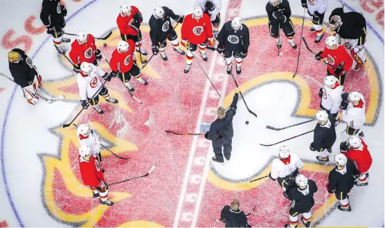  ?? AL CHAREST ?? It’s been well over a month that coach Bill Peters has been working with the current group of Flames and now it’s time to put all of that talking into action. Quick practices. No-nonsense drills. Little time spent at the white board, Kristen Anderson writes.