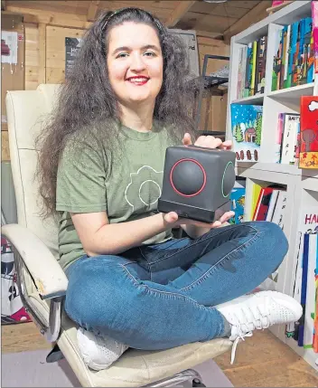  ?? Picture ?? Sam Ruderham with her Skoog designed to encourage disabled children to create their own musicChris Austin