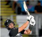  ?? PHOTOSPORT ?? Ross Taylor swats a six on Friday in his innings of 54 not out.