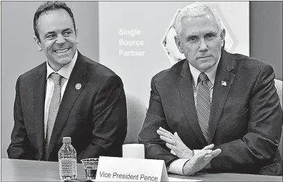  ?? [TIMOTHY D. EASLEY/THE ASSOCIATED PRESS] ?? Kentucky Gov. Matt Bevin, left, and Vice President Mike Pence address a group of business owners to gather support for the repeal and replacemen­t of the Affordable Care Act. They were at the Harshaw Trane Parts and Distributi­on Center in Louisville,...