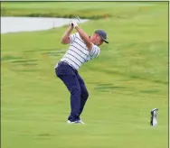  ?? Charlie Neibergall / Associated Press ?? Team USA’s Bryson DeChambeau hits on the fifth hole during a practice day at the Ryder Cup at the Whistling Straits Golf Course on Tuesday in Sheboygan, Wis.