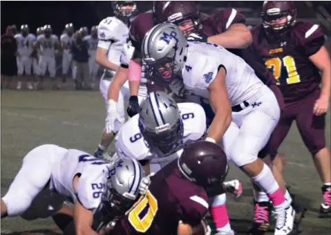  ?? BY BILL RUDICK - FOR DIGITAL FIRST MEDIA ?? Avon Grove running back Sean Glatts is stopped for a loss against Malvern Prep on Friday.