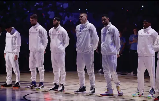  ?? GETTY IMAGES ?? ‘VERY EMOTIONAL’: Celtics forward Jayson Tatum, third from left, is introduced before the NBA All-Star Game at the United Center in Chicago on Sunday night.