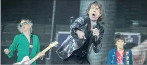 ?? PICTURE: REUTERS ?? STICKY FINGERS: Keith Richards, Mick Jagger and Ron Wood of the Rolling Stones perform.