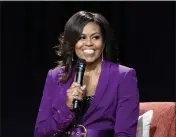 ?? PHOTO BY PAUL R. GIUNTA — INVISION — FILE ?? Former first lady Michelle Obama during “Becoming: An Intimate Conversati­on with Michelle Obama” in Atlanta on May 11, 2019.