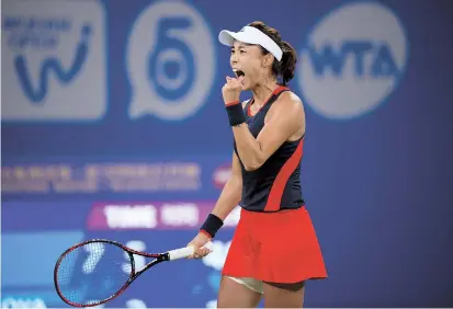  ??  ?? Wang Qiang of China reacts after beating Australia’s Daria Gavrilova 7-5, 6-2 in the WTA Wuhan Open third round in Wuhan, central China’s Hubei Province, yesterday. — AFP