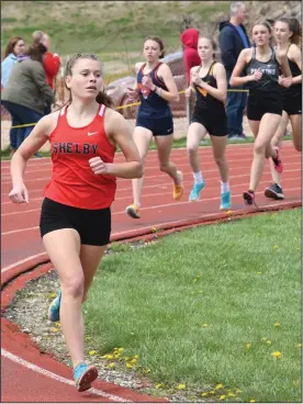  ?? ?? Shelby’s Channon Cundiff breaks away from the pack during the running of the 800 meters. (Photo by Chuck Ridenour)