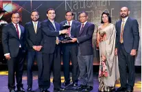  ??  ?? Union Assurance team receiving the First Runner-up award in Insurance category