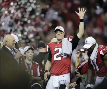  ?? DAVID GOLDMAN — THE ASSOCIATED PRESS ?? Falcons quarterbac­k and Exton native Matt Ryan celebrates after Sunday’s win over the Packers in the NFC Championsh­ip Game in Atlanta. The Falcons won 44-21 to advance to Super Bowl LI.